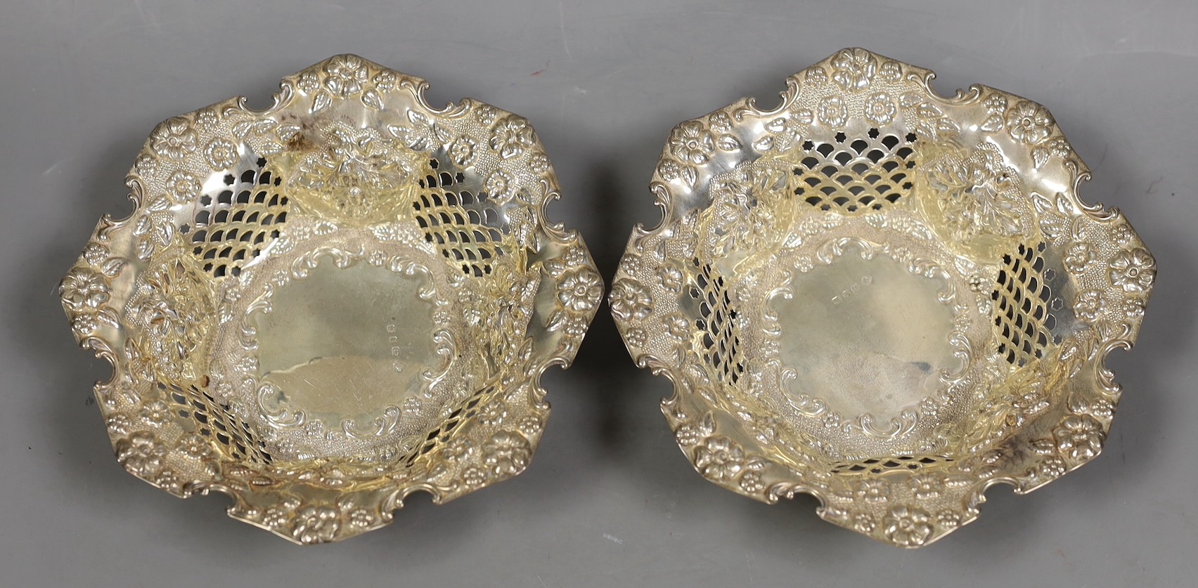 A pair of late Victorian pierced silver bonbon dishes, William Hutton & Sons, Birmingham, 1899, diameter 15.9cm, 7.1oz.